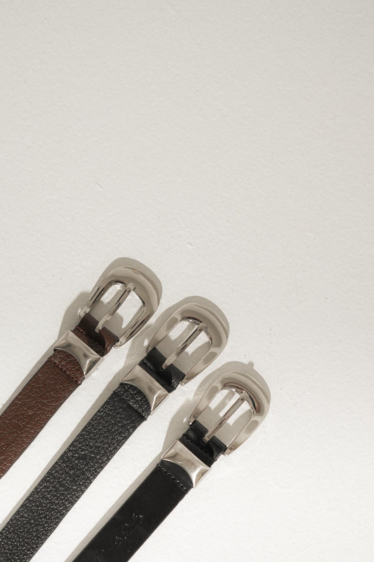 Trine Belt, all three finishes together